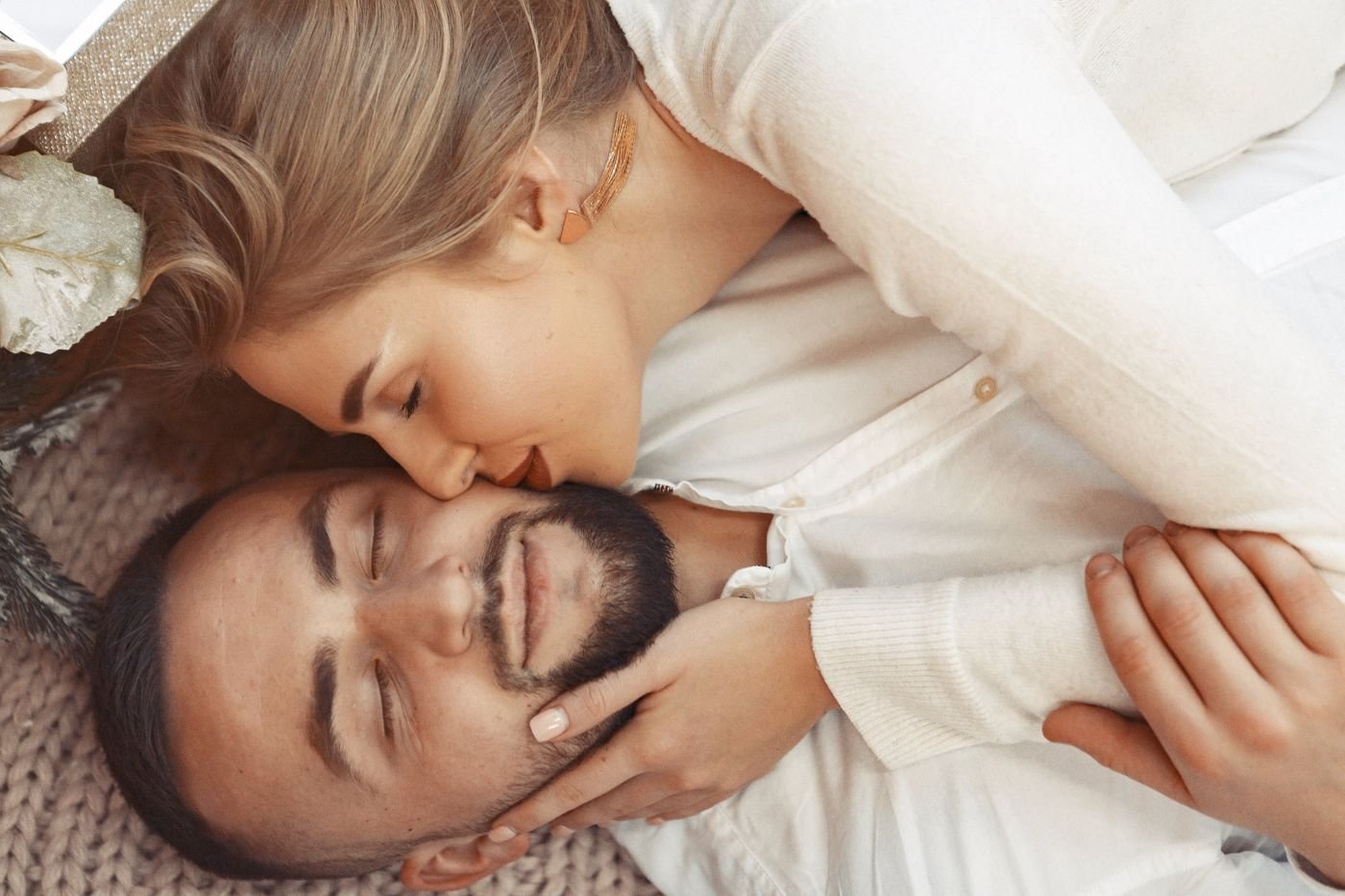 A couple relaxing together at home